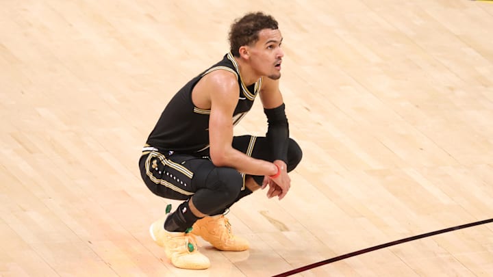 Jul 3, 2021; Atlanta, Georgia, USA; Atlanta Hawks guard Trae Young (11) reacts in the closing minutes of their loss to the Milwaukee Bucks in game six of the Eastern Conference Finals for the 2021 NBA Playoffs at State Farm Arena. Mandatory Credit: Jason Getz-Imagn Images