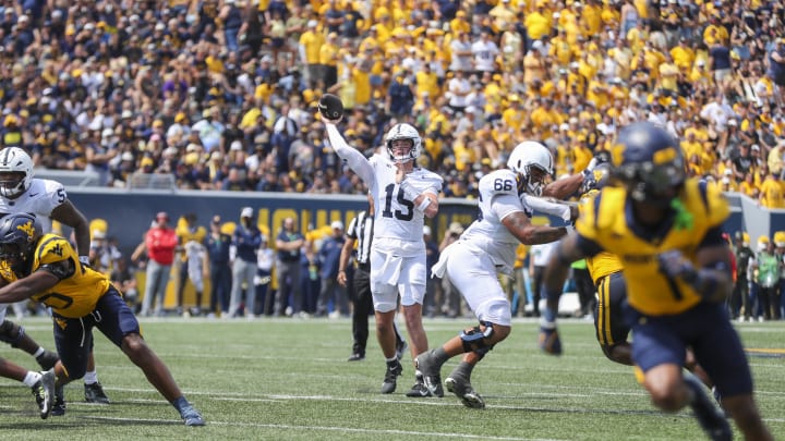 Penn State Nittany Lions quarterback Drew Allar throws a pass to Harrison Wallace III for a touchdown during the second quarter against the West Virginia Mountaineers. 