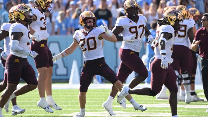 Sep 16, 2023; Chapel Hill, North Carolina, USA; Minnesota Golden Gophers defensive back Jack Henderson (20) reacts after intercepting the ball in the second quarter at Kenan Memorial Stadium. Mandatory Credit: Bob Donnan-USA TODAY Sports