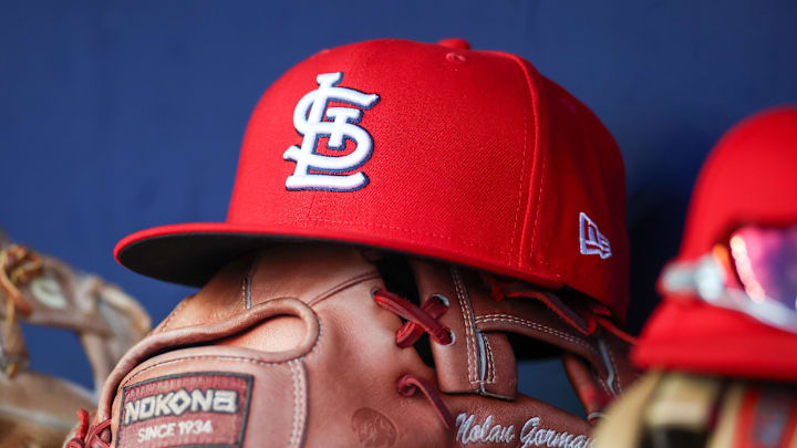 Sep 5, 2023; Atlanta, Georgia, USA; A detailed view of the hat and glove of St. Louis Cardinals second baseman Nolan Gorman (not pictured) before a game against the Atlanta Braves at Truist Park. Mandatory Credit: Brett Davis-Imagn Images
