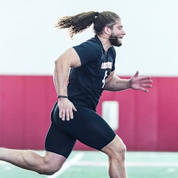 Louisville defensive end Ashton Gillotte runs a 40 yard dash during Pro Day at the UofL Football's Trager Indoor Practice Facility Tuesday, March 25, 2025.