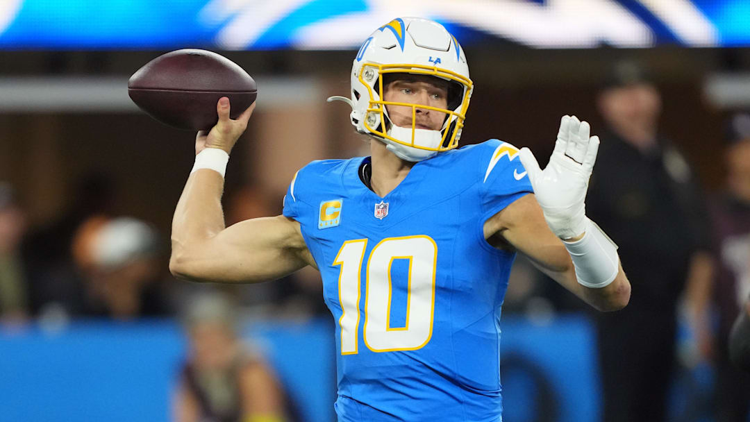 Dec 8, 2025; Inglewood, California, USA; Los Angeles Chargers quarterback Justin Herbert (10) passes against the Philadelphia Eagles in the first half at SoFi Stadium. Mandatory Credit: Kirby Lee-Imagn Images