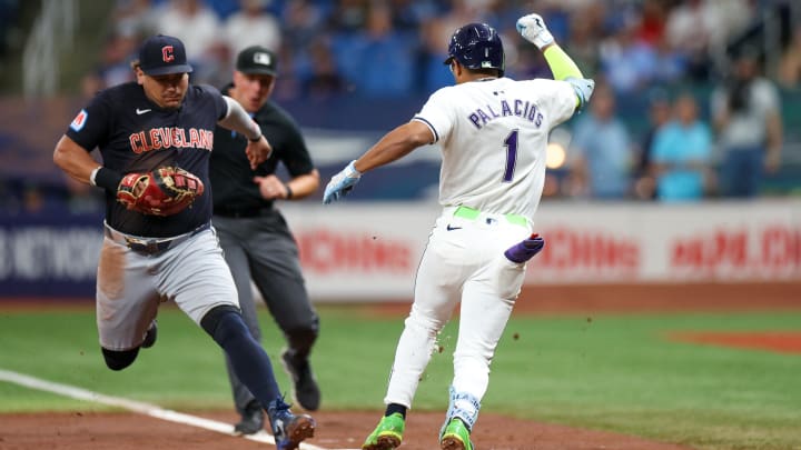 Jul 12, 2024; St. Petersburg, Florida, USA; Cleveland Guardians first baseman Josh Naylor (22) beats Tampa Bay Rays second baseman Richie Palacios (1) to first base for an out in the second inning at Tropicana Field. Mandatory Credit: Nathan Ray Seebeck-USA TODAY Sports