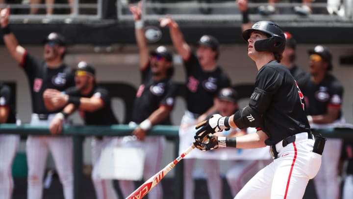 Georgia's Charlie Condon (24) watches the ball fly after hitting a home run during a NCAA Athens Regional baseball game against Army in Athens, Ga., on Friday, May 31, 2024. Georgia won 8-7. Georgia's Charlie Condon (24) watches the ball fly after hitting a home run during a NCAA Athens Regional baseball game against Army in Athens, Ga., on Friday, May 31, 2024. Georgia won 8-7.