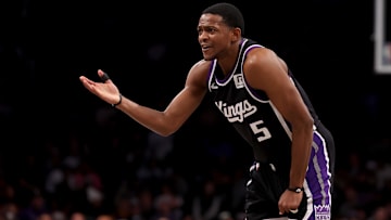 Jan 27, 2025; Brooklyn, New York, USA; Sacramento Kings guard De'Aaron Fox (5) reacts during the second quarter against the Brooklyn Nets at Barclays Center. Mandatory Credit: Brad Penner-Imagn Images