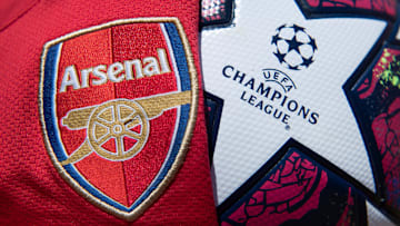 The Arsenal Club Badge with a UEFA Champions League Match Ball