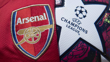 The Arsenal Club Badge with a UEFA Champions League Match Ball