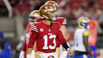 Dec 12, 2024; Santa Clara, California, USA; San Francisco 49ers quarterback Brock Purdy (13) walks towards the sidelines after throwing an incomplete pass against the Los Angeles Rams at Levi's Stadium.