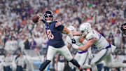 Dec 16, 2024; Minneapolis, Minnesota, USA; Chicago Bears quarterback Caleb Williams (18) passes against the Minnesota Vikings linebacker Andrew Van Ginkel (43) in the third quarter at U.S. Bank Stadium. Mandatory Credit: Brad Rempel-Imagn Images