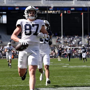 Penn State tight end Andrew Rappleyea runs the ball into the end zone for a touchdown during Blue-White spring game at Beaver Stadium. 