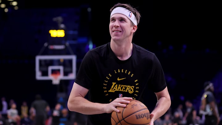 Mar 10, 2025; Brooklyn, New York, USA; Los Angeles Lakers guard Austin Reaves (15) warms up before a game against the Brooklyn Nets at Barclays Center. Mandatory Credit: Brad Penner-Imagn Images