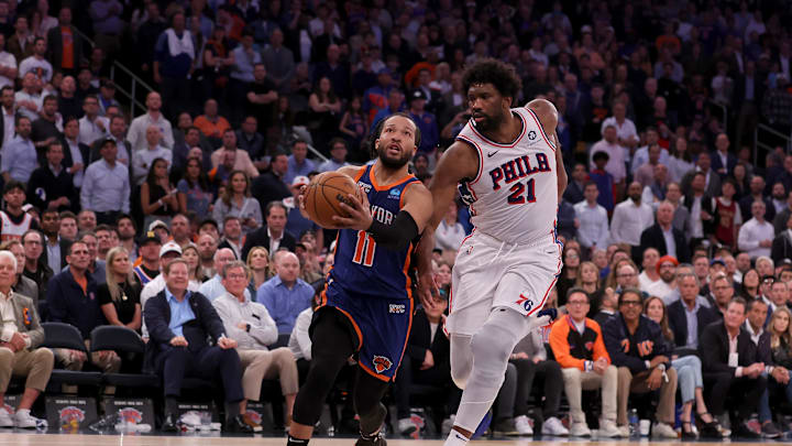 Apr 30, 2024; New York, New York, USA; New York Knicks guard Jalen Brunson (11) drives to the basket against Philadelphia 76ers center Joel Embiid (21) during overtime in game 5 of the first round of the 2024 NBA playoffs at Madison Square Garden. Mandatory Credit: Brad Penner-Imagn Images