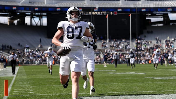 Penn State tight end Andrew Rappleyea runs the ball into the end zone for a touchdown during Blue-White spring game at Beaver Stadium. 