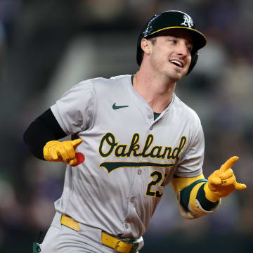 Aug 30, 2024; Arlington, Texas, USA; Oakland Athletics outfielder Brent Rooker (25) reacts as he rounds the bases after hitting a home run against the Texas Rangers in the seventh inning at Globe Life Field. Mandatory Credit: Tim Heitman-USA TODAY Sports