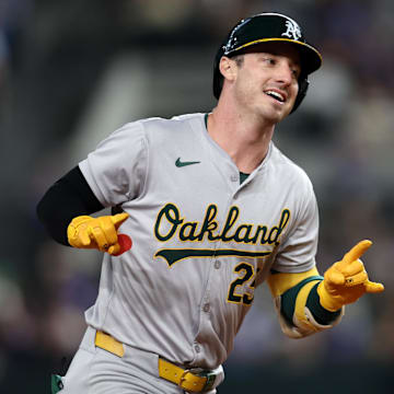 Aug 30, 2024; Arlington, Texas, USA; Oakland Athletics outfielder Brent Rooker (25) reacts as he rounds the bases after hitting a home run against the Texas Rangers in the seventh inning at Globe Life Field. Mandatory Credit: Tim Heitman-Imagn Images