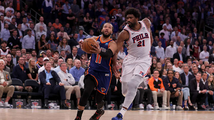 Apr 30, 2024; New York, New York, USA; New York Knicks guard Jalen Brunson (11) drives to the basket against Philadelphia 76ers center Joel Embiid (21) during overtime in game 5 of the first round of the 2024 NBA playoffs at Madison Square Garden. Mandatory Credit: Brad Penner-Imagn Images