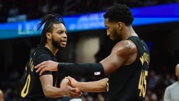 Dec 6, 2023; Cleveland, Ohio, USA; Cleveland Cavaliers guard Darius Garland (10) celebrates with guard Donovan Mitchell (45) during the second half against the Orlando Magic at Rocket Mortgage FieldHouse. Mandatory Credit: Ken Blaze-USA TODAY Sports