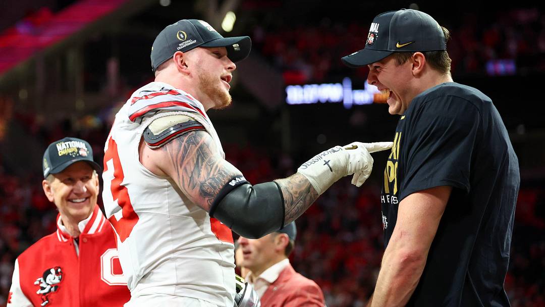 Jan 20, 2025; Atlanta, GA, USA; Ohio State Buckeyes defensive end Jack Sawyer (33) and quarterback Will Howard (18) celebrate after winning the CFP National Championship college football game at Mercedes-Benz Stadium. Mandatory Credit: Mark J. Rebilas-Imagn Images Jan 20, 2025; Atlanta, GA, USA; Ohio State Buckeyes defensive end Jack Sawyer (33) and quarterback Will Howard (18) celebrate after winning the CFP National Championship college football game at Mercedes-Benz Stadium. Mandatory Credit: Mark J. Rebilas-Imagn Images