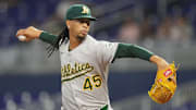 May 3, 2025; Miami, Florida, USA;  Oakland Athletics pitcher Osvaldo Bido (45) pitches in the first inning against the Miami Marlins at loanDepot Park. Mandatory Credit: Jim Rassol-Imagn Images