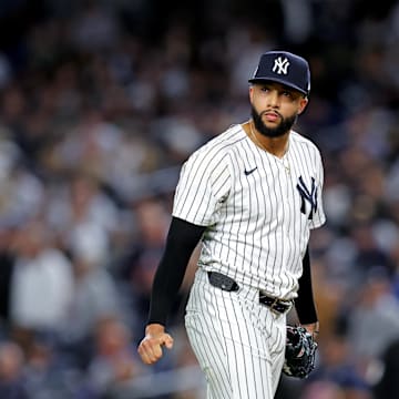 Oct 8, 2025; Bronx, New York, USA; New York Yankees pitcher Devin Williams (38) reacts after giving up a two run RBI during the seventh inning during game four of the ALDS round for the 2025 MLB playoffs at Yankee Stadium. Mandatory Credit: Brad Penner-Imagn Images