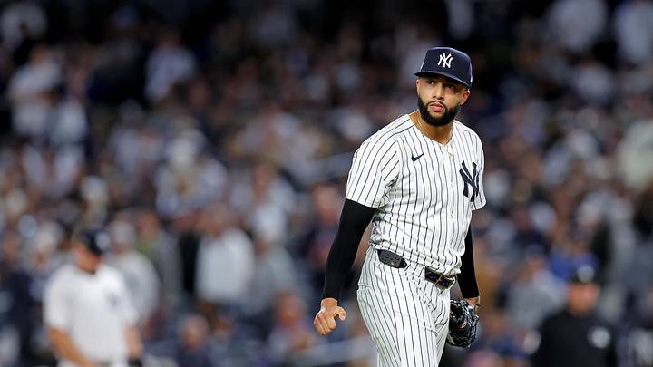 Oct 8, 2025; Bronx, New York, USA; New York Yankees pitcher Devin Williams (38) reacts after giving up a two run RBI during the seventh inning during game four of the ALDS round for the 2025 MLB playoffs at Yankee Stadium. Mandatory Credit: Brad Penner-Imagn Images