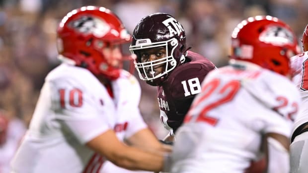 Texas A&M defender watches a play unfold