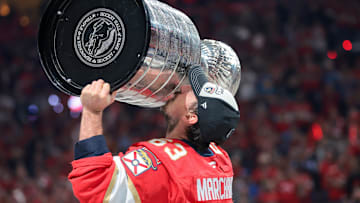 Florida Panthers Brad Marchand (63) hoists the Stanley Cup. Mandatory Credit: Sam Navarro-Imagn Images