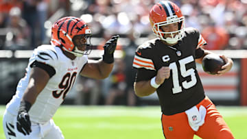 Sep 7, 2025; Cleveland, Ohio, USA; Cleveland Browns quarterback Joe Flacco (15) scrambles from Cincinnati Bengals defensive tackle Kris Jenkins Jr. (90) during the fourth quarter at Huntington Bank Field. Mandatory Credit: Ken Blaze-Imagn Images