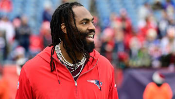 Dec 17, 2023; Foxborough, Massachusetts, USA; New England Patriots linebacker Matthew Judon (9) greets fans before a game against the Kansas City Chiefs at Gillette Stadium. Mandatory Credit: Eric Canha-USA TODAY Sports