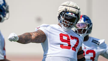 New York Giants defensive tackle Dexter Lawrence II (97) instructs his teammates in a drill during day one of the New York Giants training camp at Quest Diagnostics Giants Training Center in East Rutherford on Wednesday, July 23, 2025.