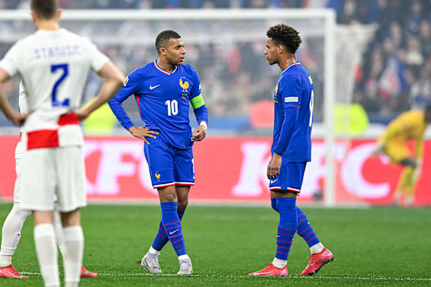 Kylian Mbappe and Desire Doue playing for France