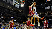 Mar 29, 2025; Newark, NJ, USA; Duke Blue Devils forward Cooper Flagg (2) goes up to dunk the ball against Alabama Crimson Tide forward Grant Nelson (4) during the second half in the East Regional final of the 2025 NCAA tournament at Prudential Center. Mandatory Credit: Robert Deutsch-Imagn Images