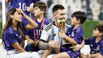 Inter Miami's Lionel Messi celebrates winning the 2022 World Cup with his family in Qatar.