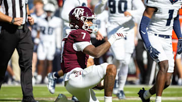 Nov 22, 2025; College Station, Texas, USA; Texas A&M Aggies wide receiver KC Concepcion (7) signals first down in the first half of game against the Samford Bulldogs at Kyle Field. Mandatory Credit: Joseph Buvid-Imagn Images