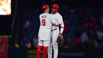 Anaheim, California, USA; Los Angeles Angels shortstop Zach Neto (9) and second baseman Christian Moore (4) celebrate the victory against the Boston Red Sox at Angel Stadium.