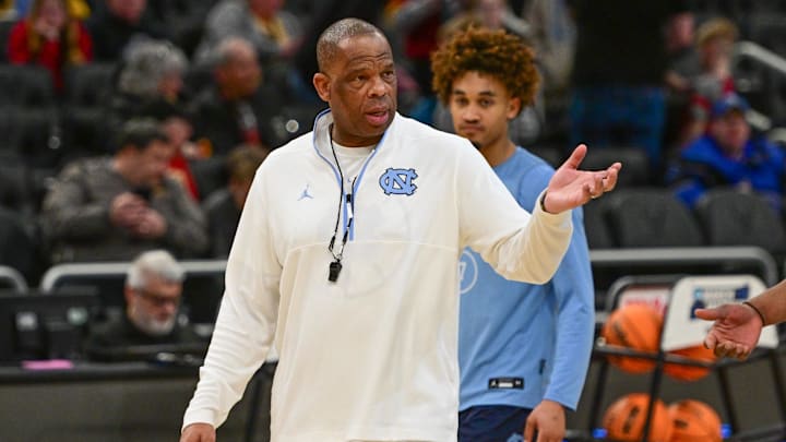 Mar 20, 2025; Milwaukee, WI, USA; North Carolina Tar Heels head coach Hubert Davis watches team workout during NCAA Tournament First Round Practice at Fiserv Forum. Mandatory Credit: Benny Sieu-Imagn Images