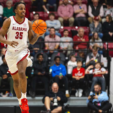 Dec 22, 2024; Tuscaloosa, Alabama, USA; Alabama Crimson Tide forward Derrion Reid (35) drives the ball down the court against the Kent State Golden Flashes during the second half at Coleman Coliseum. Mandatory Credit: Will McLelland-Imagn Images