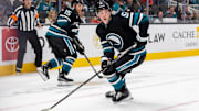 Mar 13, 2025; San Jose, California, USA; San Jose Sharks right wing Collin Graf (51) skates with the puck during the third period against the Chicago Blackhawks at SAP Center at San Jose. Mandatory Credit: Bob Kupbens-Imagn Images