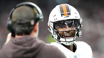 Nov 23, 2025; Paradise, Nevada, USA; Cleveland Browns quarterback Shedeur Sanders (12) talks to head coach Kevin Stefanski in the first half against the Las Vegas Raiders at Allegiant Stadium. Mandatory Credit: Stephen R. Sylvanie-Imagn Images