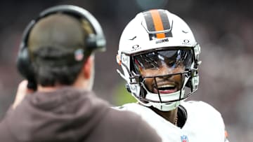 Nov 23, 2025; Paradise, Nevada, USA; Cleveland Browns quarterback Shedeur Sanders (12) talks to head coach Kevin Stefanski in the first half against the Las Vegas Raiders at Allegiant Stadium. Mandatory Credit: Stephen R. Sylvanie-Imagn Images