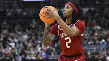 Mar 20, 2025; Providence, RI, USA;  Arkansas Razorbacks guard Boogie Fland (2) controls the ball during the second half against the Kansas Jayhawks at Amica Mutual Pavilion. Mandatory Credit: Eric Canha-Imagn Images