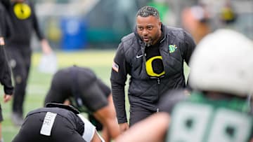 Oregon wide receivers coach Ross Douglas works with players during Oregon’s spring game on April 26, 2025, at Autzen Stadium in Eugene.