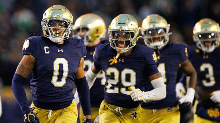 Notre Dame safety Xavier Watts, left, celebrates getting an interception with his teammates earlier this season. Notre Dame safety Xavier Watts, left, celebrates getting an interception with his teammates earlier this season.