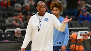 Mar 20, 2025; Milwaukee, WI, USA; North Carolina Tar Heels head coach Hubert Davis watches team workout during NCAA Tournament First Round Practice at Fiserv Forum. Mandatory Credit: Benny Sieu-Imagn Images