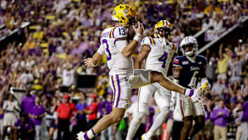 Garrett Nussmeier #13 of the LSU Tigers runs in for a touchdown against the South Alabama Jaguars during the first half at Tiger Stadium on September 28, 2024 in Baton Rouge, Louisiana.