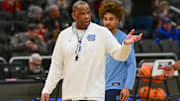 Mar 20, 2025; Milwaukee, WI, USA; North Carolina Tar Heels head coach Hubert Davis watches team workout during NCAA Tournament First Round Practice at Fiserv Forum. Mandatory Credit: Benny Sieu-Imagn Images