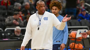 Mar 20, 2025; Milwaukee, WI, USA; North Carolina Tar Heels head coach Hubert Davis watches team workout during NCAA Tournament First Round Practice at Fiserv Forum. Mandatory Credit: Benny Sieu-Imagn Images