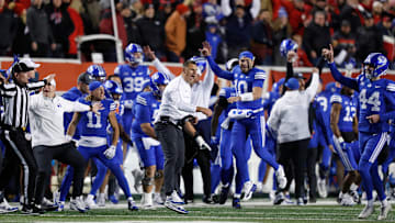 BYU celebrates a last-second win over heated rival Utah.