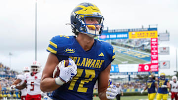 Delaware tight end Caleb Fauria pulls in a pass in the end zone for a touchdown in the second quarter against Sacred Heart at Delaware Stadium, Saturday, Sept. 28, 2024.