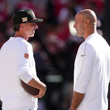 Sep 9, 2024; Santa Clara, California, USA; San Francisco 49ers head coach Kyle Shanahan (left) and New York Jets head coach Robert Saleh (right) talk before the game at Levi's Stadium. Mandatory Credit: Darren Yamashita-Imagn Images